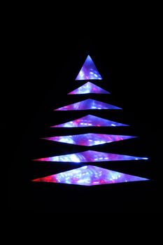 nice xmas tree isolated on the black background