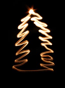 nice xmas tree isolated on the black background