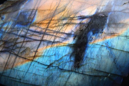 labradorite natural golden and blue mineral background