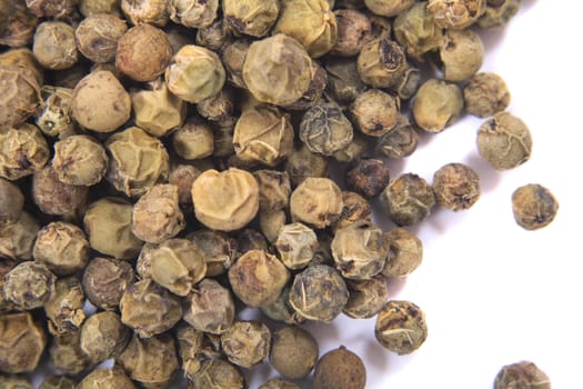 green peppercorn isolated on the white background