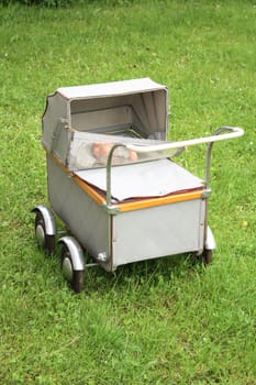 very old buggy in the green park 