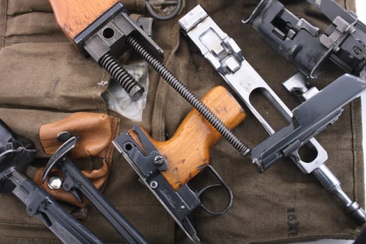 parts of automatic gun as nice army background