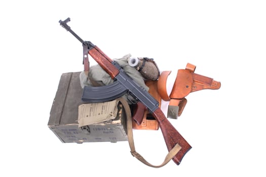 automatic gun and accesories on the white background