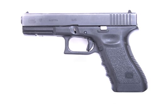 nice hand gun isolated on the white background