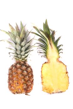 halved fresh pineapple on the white background