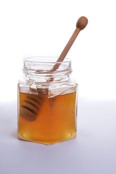 sweet honey isolated on the white background