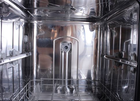 new empty dishwasher as original kitchen background