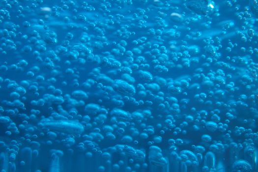 Natural water background in the blue color