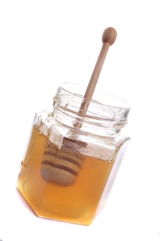 fresh honey isolated on the white background