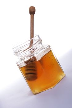 sweet honey isolated on the white background