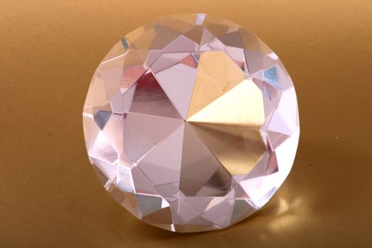 very nice diamond isolated on the golden background
