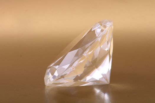 very nice diamond isolated on the golden background