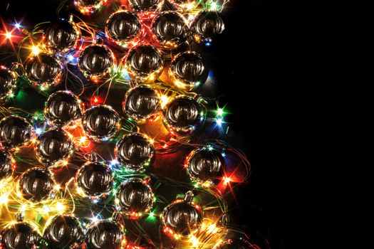 xmas background with color lights on the black background
