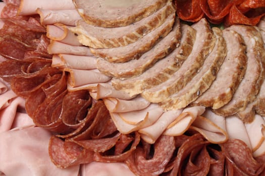 fresh different salami background from the party 