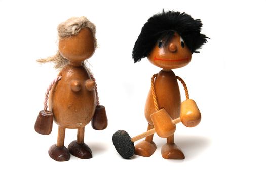 old wooden toys on the white background 