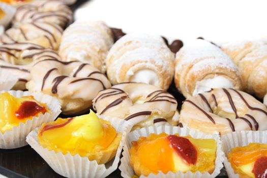 fresh sweet desserts on the white background