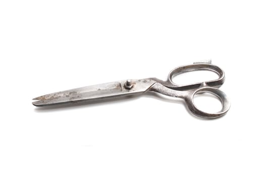 old scissors isolated on the white background