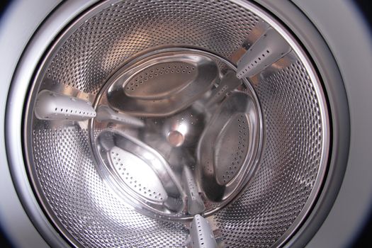 inside of empty and clear wash machine 