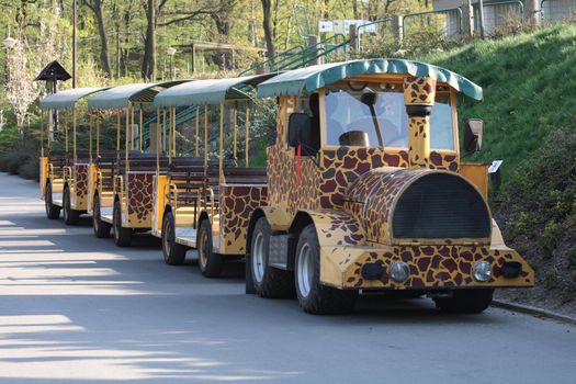 Small ZOO train with giraffe texture in city of ostrava