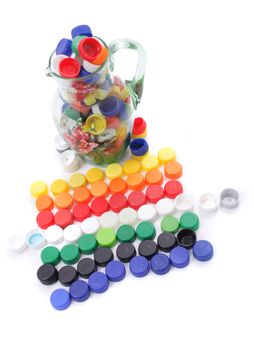 color caps in the glass isolated on the white background