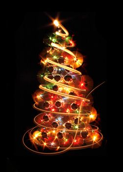color xmas tree isolated on the black background
