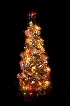 christmas tree from the color lights on the black background