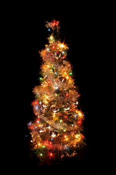 christmas tree from the color lights on the black background