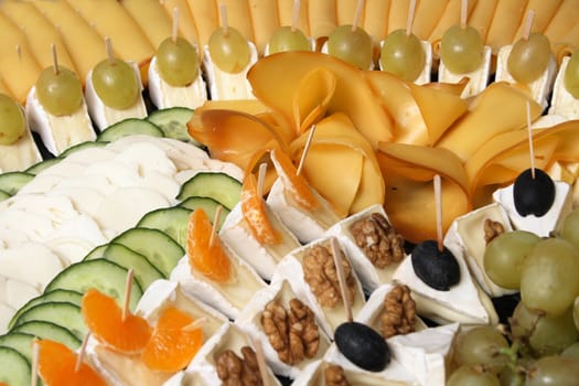 cheese snack with fruit and nuts from the party 