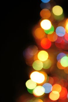 christmas background with color lights of xmas tree