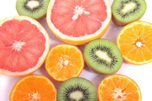 fresh fruits (kiwi orange etc..) on the white background