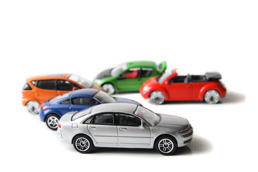 color metal toys on the white background 