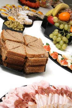 detail of food from the party on the white background