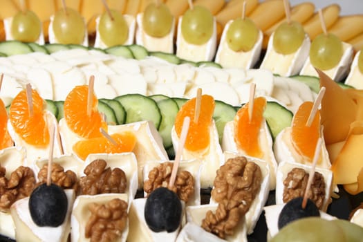 cheese snack with fruit and nuts from the party 