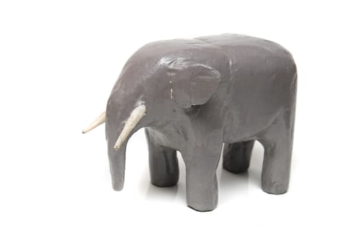 handmade wooden elephant on the white background
