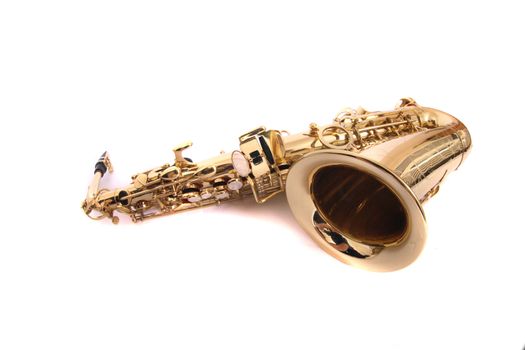 new gold saxophone on the white background