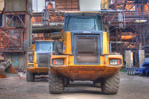 natural yellow trucks from the steel factory 