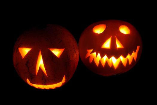 nice halloween pumpkins on the black background