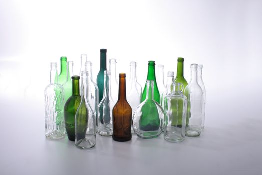 color glass bottles on the white background