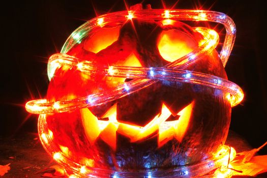 halloween pumpkin with light in the dark night 