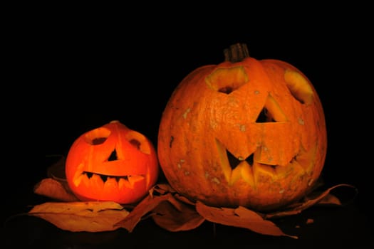 halloween pumpkins isolated on the black background