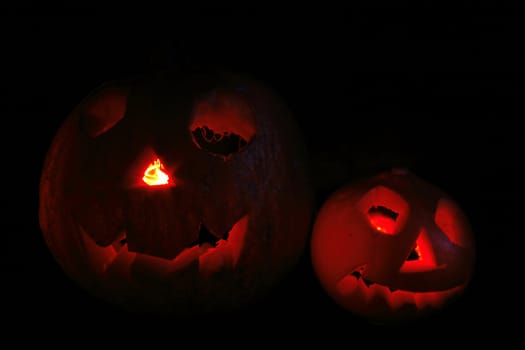 halloween pumpkins isolated on the black background
