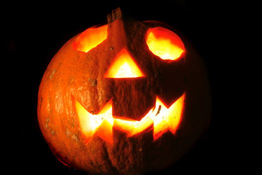 pumkin with ligths in dark halloween symbol
