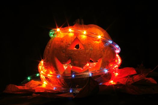 halloween pumpkin with light in the dark night 