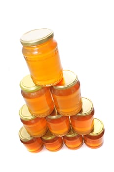 fresh honey isolated on the white background