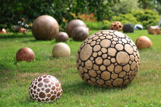spheres from different materials in the park