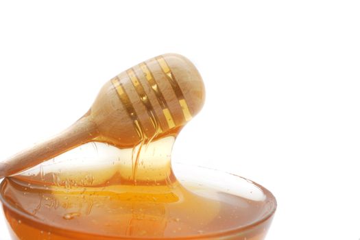 fresh honey isolated on the white background