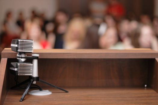 microphone from the hall with many people 
