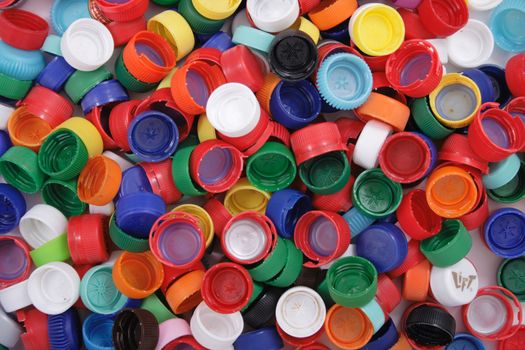 color plastic caps as easy recycle background