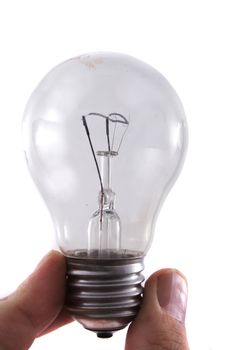 light bulb in the hand isoletad on the white background