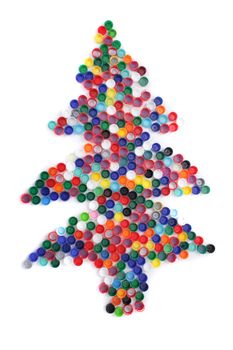 color plastic caps as christmas tree isolated on the white background